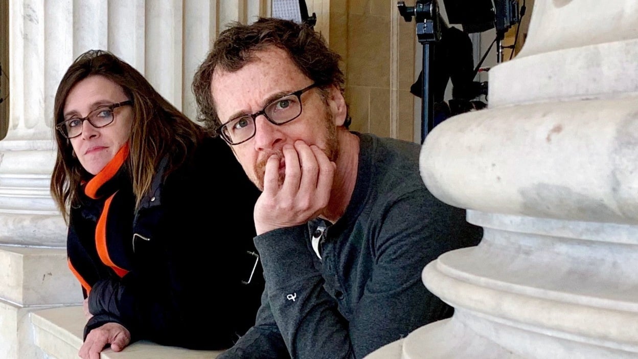 Tricia Cooke and Ethan Coen on the set of "Drive-Away Dolls."