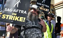  US actor Jack Black joins SAG-AFTRA members and their supporters as they walk a picket line outside Paramount Studios during their strike against the Hollywood studios, in Los Angeles, California, on November 8, 2023. The union representing striking actors said on November 6, 2023, it could not agree to studios’ “last, best and final offer” issued over the weekend in a bid to end a months-long stalemate that has crippled Hollywood.