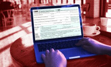 A person filling out tax forms online.