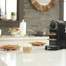 nespresso citiZ machine on a kitchen counter with food