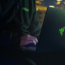 Person using a Razer Blade 15 gaming laptop