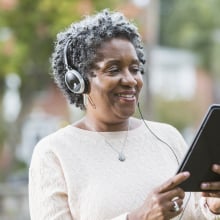 woman listening to audio book