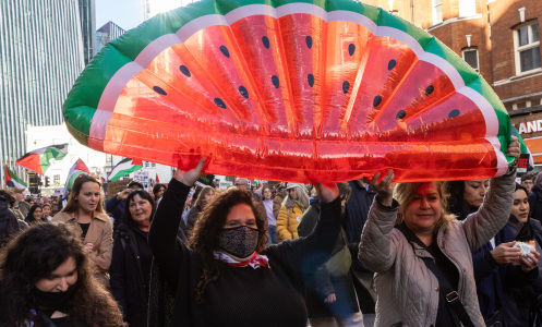 Pro-Palestinian protesters holding an inflatable water melon, a symbol of resistance in occupied Palestine, take part in an Armistice Day march from Hyde Park to the US embassy to call for an immediate ceasefire in Gaza on 11th November 2023 in London, United Kingdom. The march was organised by Palestine Solidarity Campaign (PSC), Stop the War Coalition, Friends of Al-Aqsa, Muslim Association of Britain and Palestinian Forum in Britain. Mass Palestinian solidarity rallies have been held around the world for a fifth consecutive weekend to call for an end to the Israeli bombardment of Gaza.