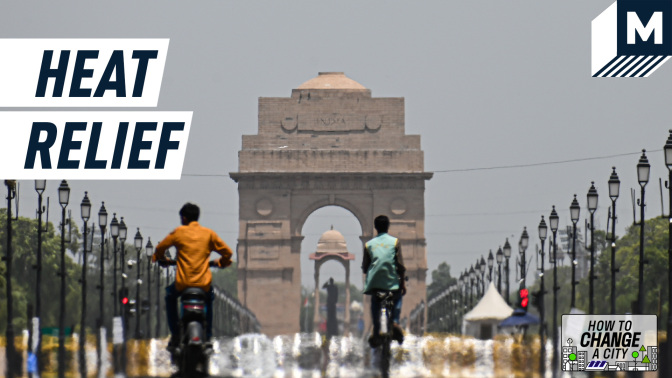 A still image showing a main road in New Delhi in the heat. Caption reads: "heat relief"