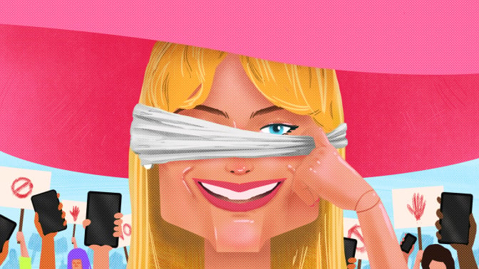 A caricature of Margot Robbie as Barbie peeks around a blindfold. Behind her is a crowd holding up protest signs and cellphones.