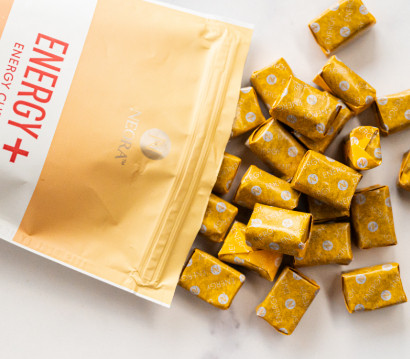 Neora Energy+ Wellness Chews bolsa y masticables envueltos individualmente