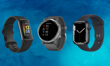 Three fitness trackers on a blue background