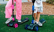 close up of kids playing on Kimi scooters