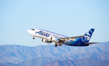 LOS ANGELES/CALIFORNIA - JANUARY 14, 2017: Alaska Airlines Boeing 737-790(WL) aircraft is airborne as it departs Los Angeles International Airport, Los Angeles, California USA