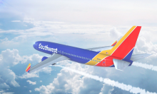 LOS ANGELES, CALIFORNIA, USA - MAY 8 2017: Aerial view of Southwest Airlines Boeing 737 on approach to runway at Los Angeles Airport. 3D Illustration.