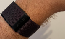 black whoop strap on man's wrist