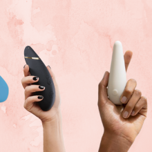 four hands holding vibrators for women