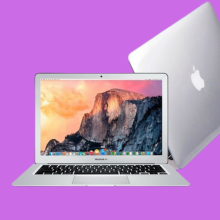 The 2017 MacBook Air in silver shown front and slightly sideways over a purplish background