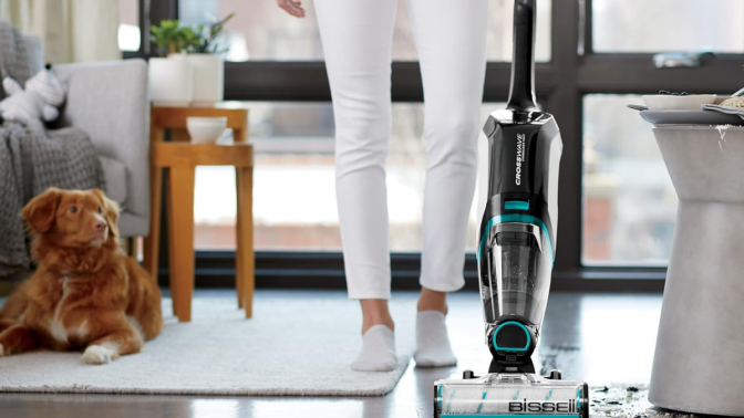 woman vacuuming floor 